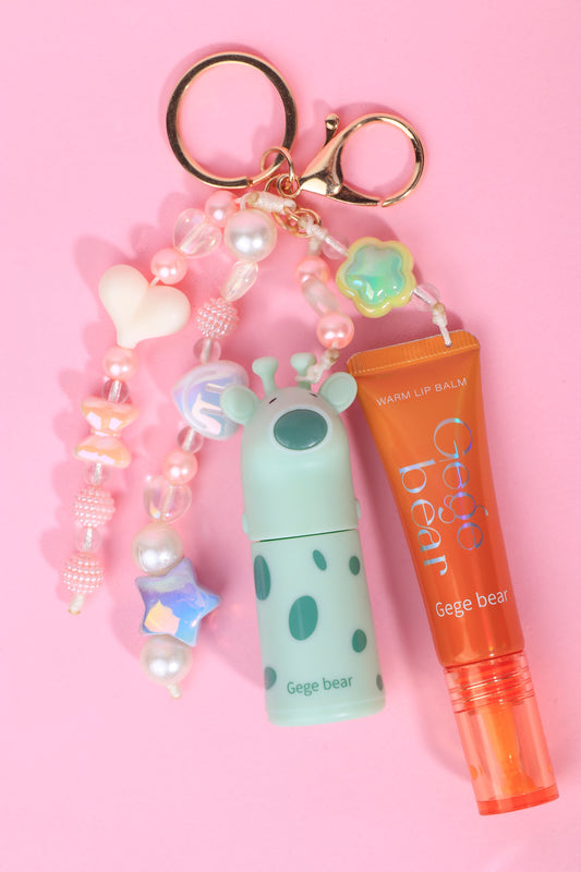🦒 LLAVERO DUO GEGE BEAR – TINTA MATE JIRAFA + LIP BALM MAGICO 🧡